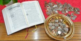 Offering Plate Full Of Coins